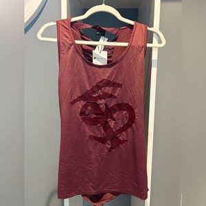 NWT FSU tank top. Burgundy w/logo on front. Pretty tie back. Sz large